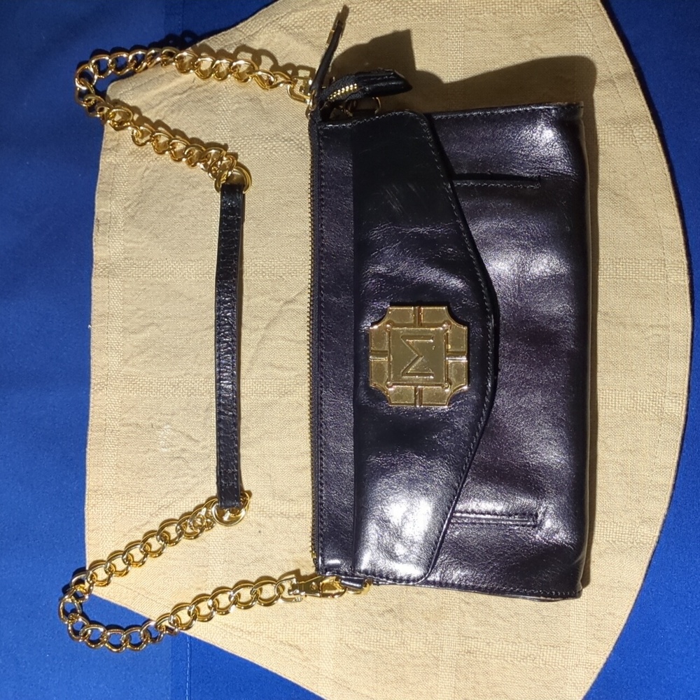 Monet Black Leather Clutch with Gold Chain Asking Price $30